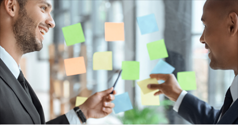 business people  with sticky notes planning